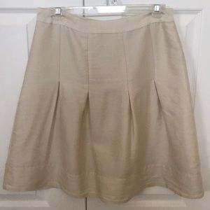 Cream pleated miniskirt from H&M